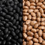 Black beans and pinto beans in bowls for comparison