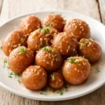 Boiled red potatoes in a pot with water