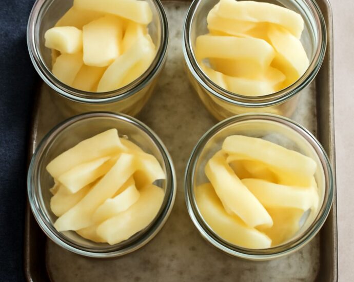 Jar of canned potatoes using a raw pack method