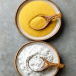 Corn flour and cornstarch side by side in bowls