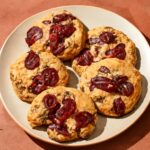 Soft date cookies on a plate with chopped dates