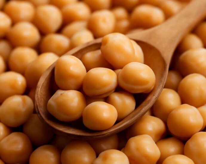 Garbanzo beans and chickpeas side by side in bowls