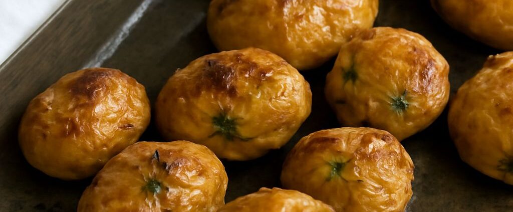 Salt boiled potatoes in a pot after cooking
