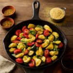 Sautéed zucchini and yellow squash in a skillet