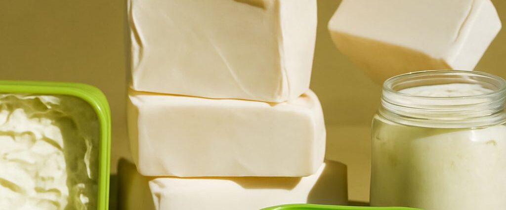 vegan butter substitute lineup with vegan butter alternatives on a board