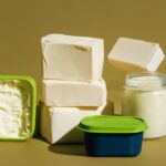 vegan butter substitute lineup with vegan butter alternatives on a board