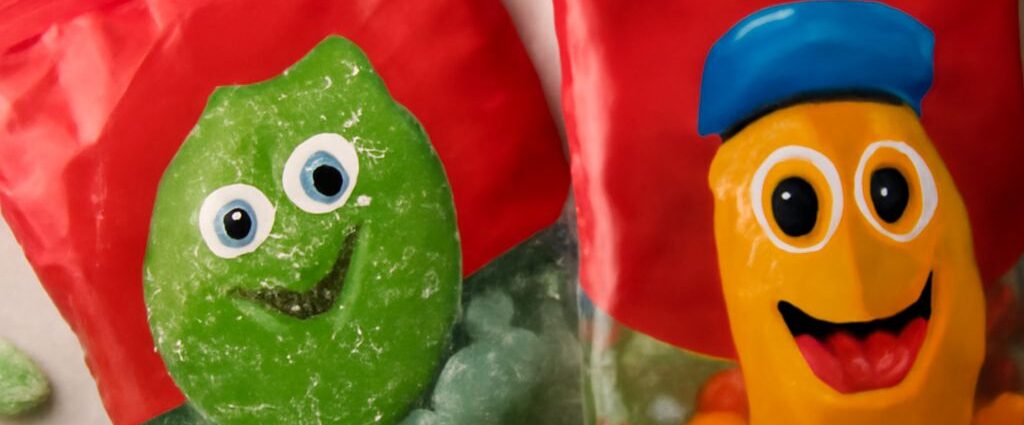Vegan candy list with colorful candy pieces and wrapped sweets