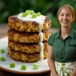 Golden pan-fried vegan crab cakes served with dipping sauce, showing the texture of a vegetarian crab cakes recipe and vegan crab cakes recipe result
