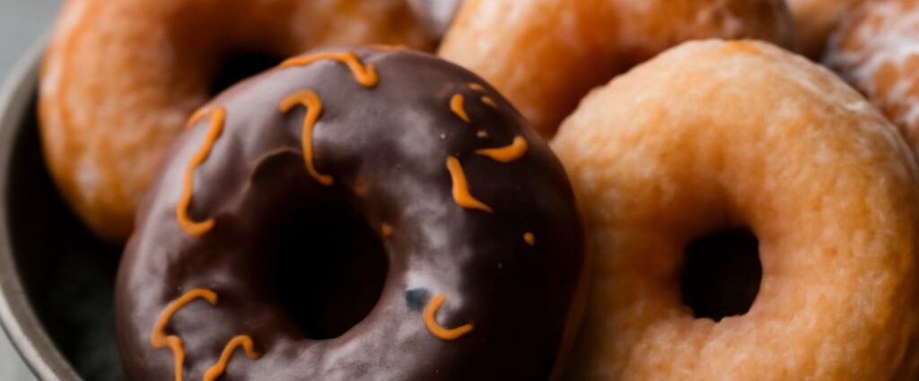 vegan donuts platter beside vegan donut recipe cards