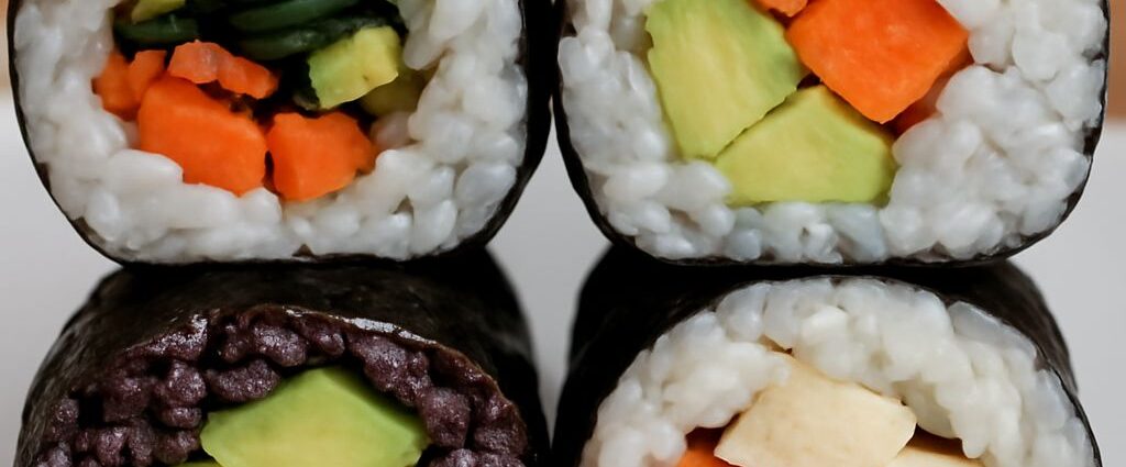 Vegan sushi rolls with rice, seaweed, and vegetable fillings