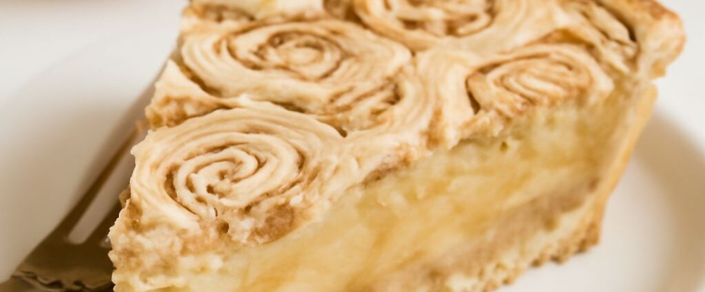 Glazed apple cinnamon roll bake with tender apple chunks and pull-apart dough