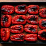 Tender browned pepper wedges on a baking sheet
