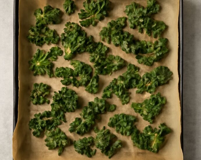 Baked kale chips beside tender roasted kale
