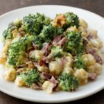 Broccoli salad with raisins, sunflower seeds, and creamy dressing