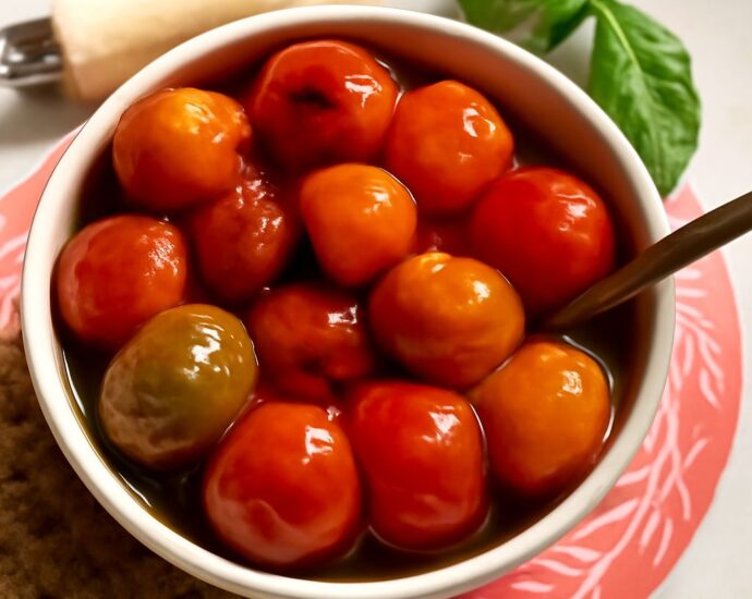 Cherry tomato confit in aromatic olive oil with garlic and herbs
