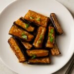 Silky Chinese eggplant pieces coated in savory sauce