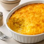 Old-fashioned corn pudding with a browned top and custardy center