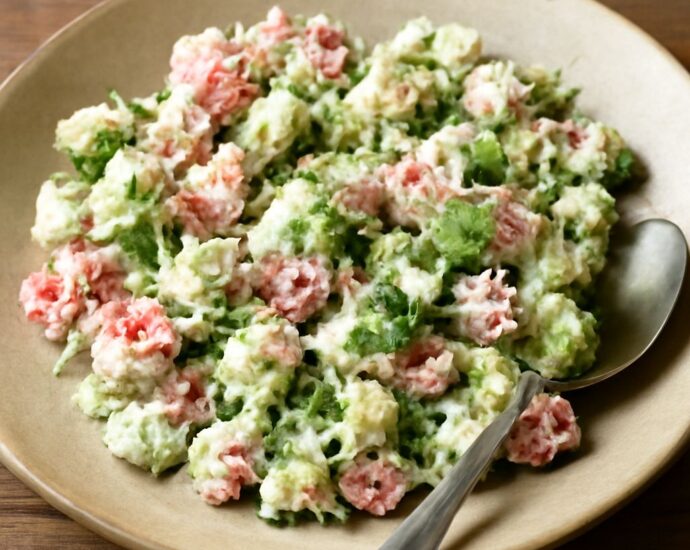Cucumber feta salad with tomatoes, block feta, fresh herbs, and vinaigrette