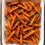 Golden sweet potato fries in a serving bowl