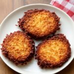 Vegan potato latkes with crisp golden edges and tender centers