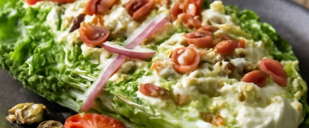 Grilled romaine lettuce recipe showing charred romaine hearts with lemon and Parmesan
