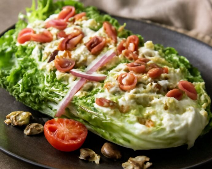 Grilled romaine lettuce recipe showing charred romaine hearts with lemon and Parmesan