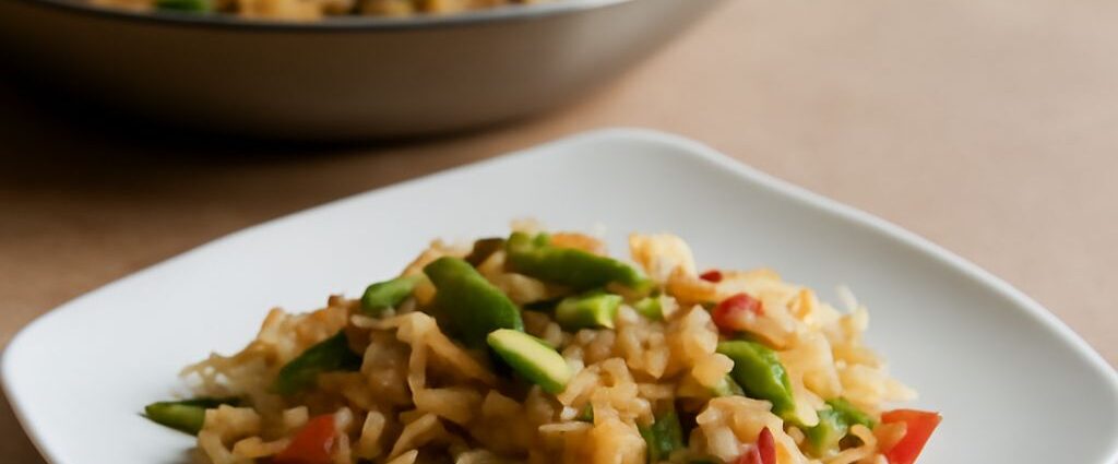Healthy fried rice with vegetables, egg, and tofu in a bowl