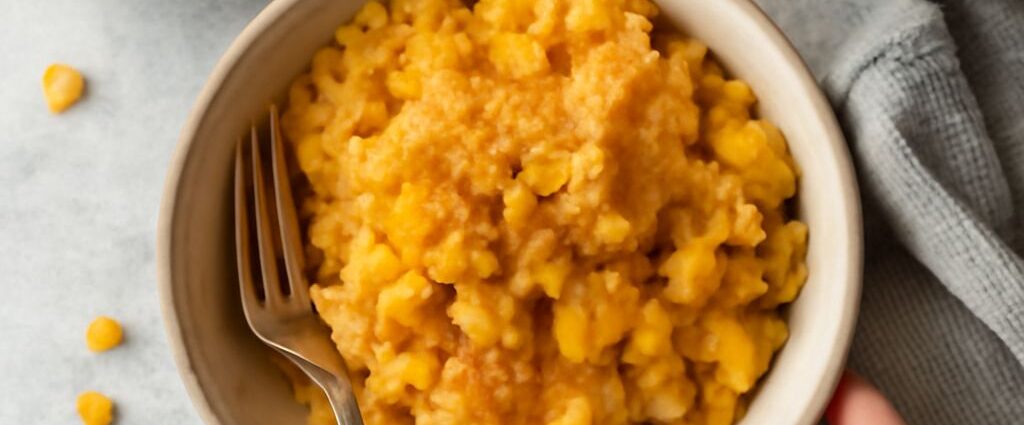 Creamy macaroni and corn casserole with tender pasta and a browned cheese top