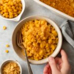 Creamy macaroni and corn casserole with tender pasta and a browned cheese top