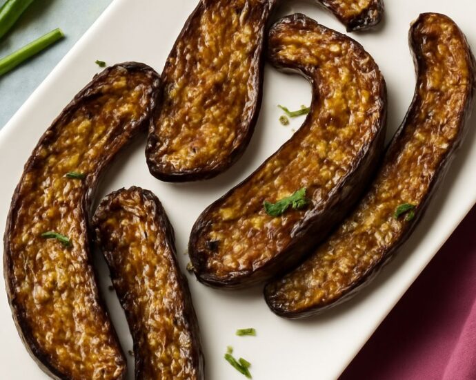 Roasted Japanese eggplant with miso glaze, tender flesh and caramelized tops