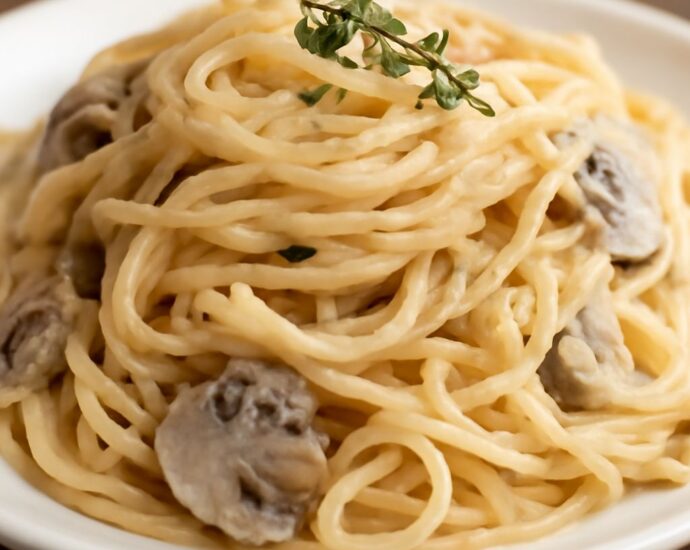 Pasta made with cream of mushroom soup coated in glossy sauce