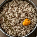 Creamy coconut-tomato pigeon peas served over rice