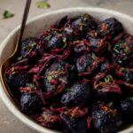 Roasted purple potatoes with garlic, olive oil, and herbs
