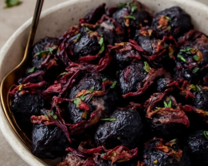 Roasted purple potatoes with garlic, olive oil, and herbs