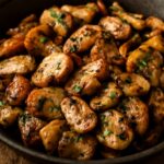 Best sauteed mushroom recipe with deeply browned, juicy mushrooms in a skillet