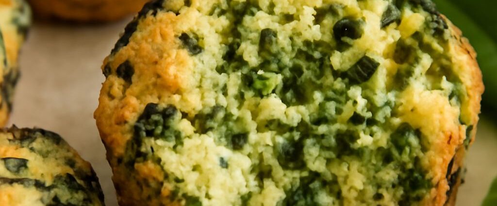 Baked spinach balls with browned edges and a set center