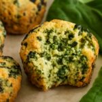 Baked spinach balls with browned edges and a set center