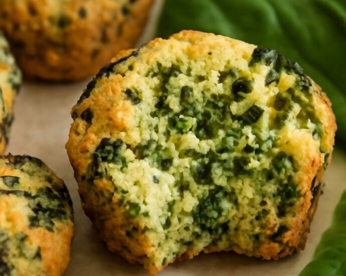 Baked spinach balls with browned edges and a set center