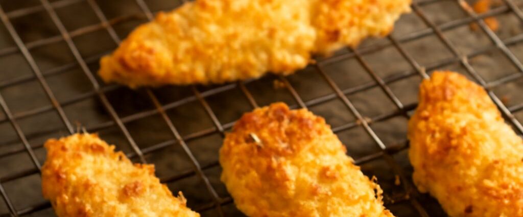Breaded chicken tenders on a plate