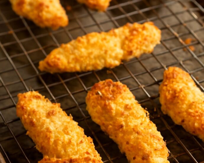 Breaded chicken tenders on a plate