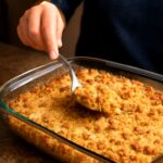 A delicious cornbread dressing in a baking dish