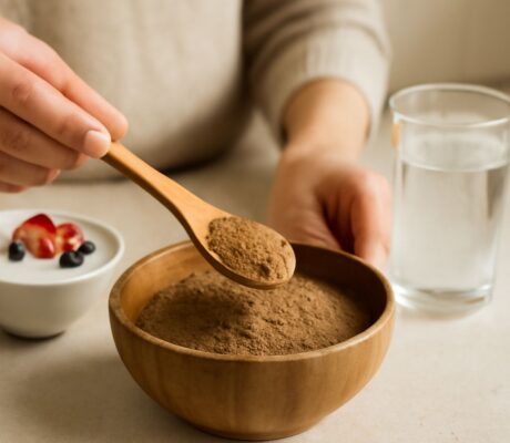 Flax seeds and ground flax meal in bowls