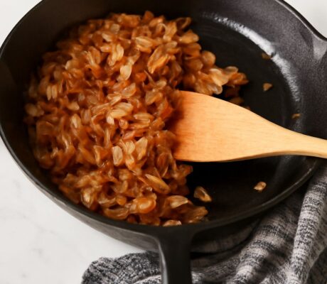 Golden and sweet caramelized onions in a pan