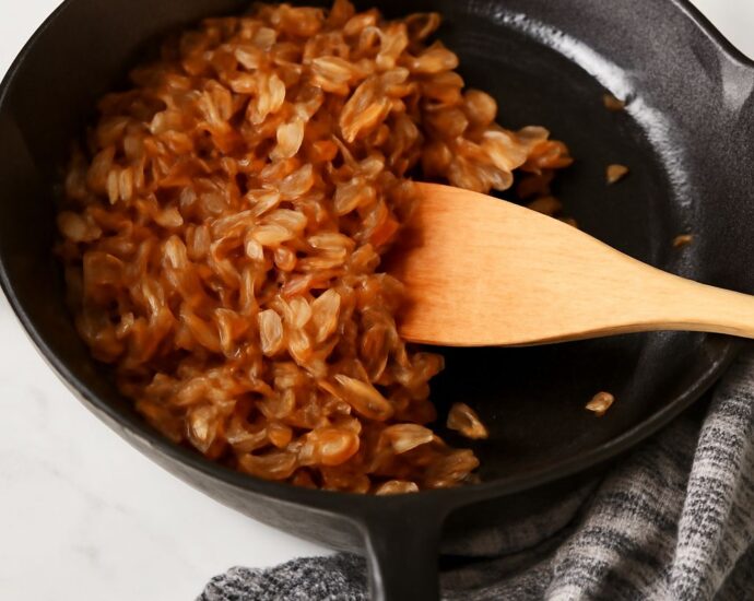 Golden and sweet caramelized onions in a pan