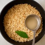 A bowl of creamy risotto with herbs and cheese
